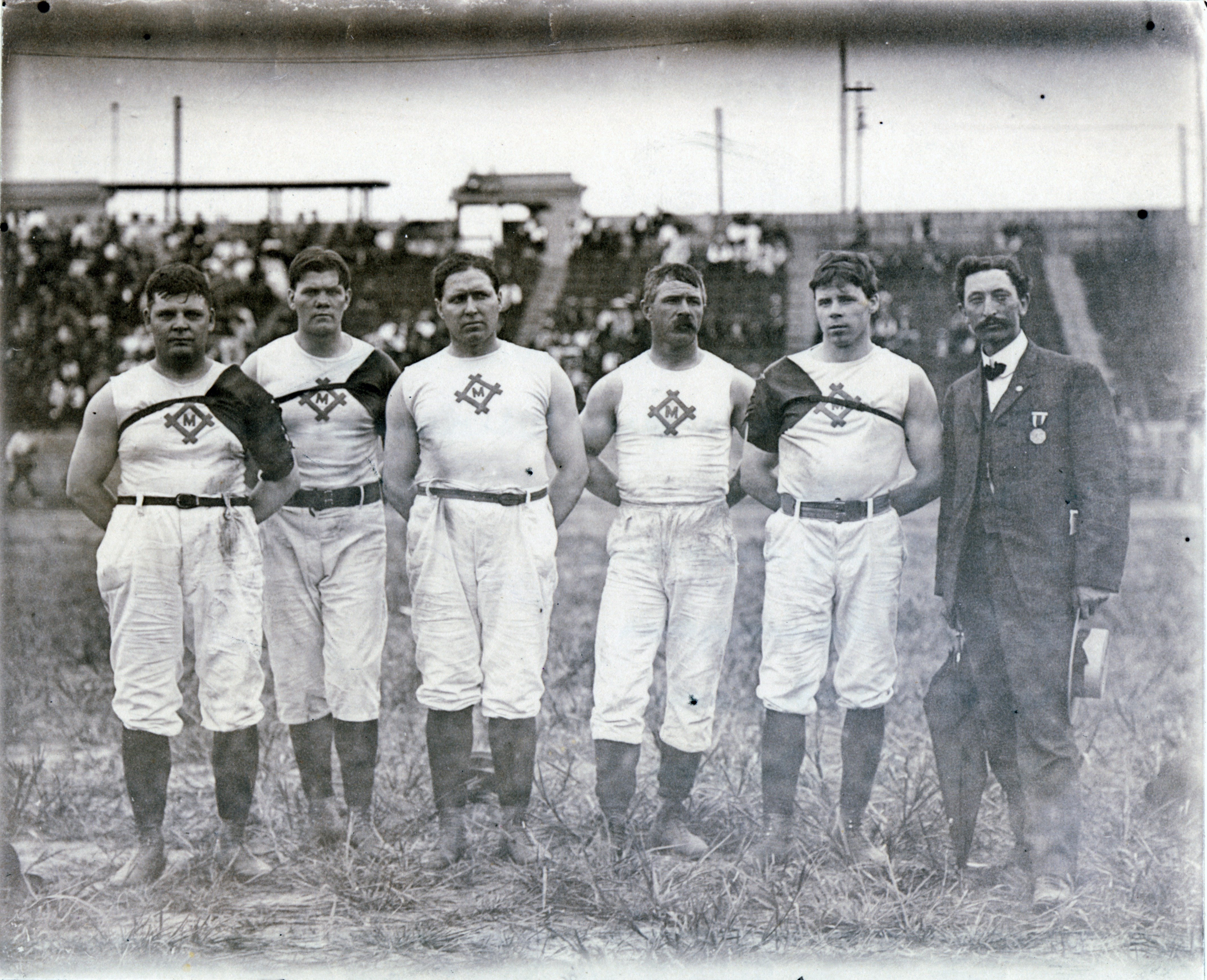 Copy of Milwaukee_Athletic_Club_champions_of_the_1904_Olympic_Tug_of_War_competition._Left_to_right,_H._Seiling,_C._Magnussen,_Flan